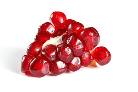 Cluster of gem like pomegranate fruit isolated on white background