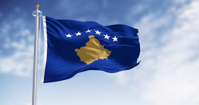 Kosovo national flag waving on a clear day. Six white stars above a golden map of Kosovo in a blue field. 3d illustration render. Rippling textured fabric.