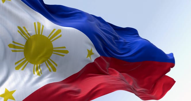 Close-up of Philippines national flag waving. Two equal horizontal blue and red bands, white triangle on the left, golden-yellow sun with eight beams at its center. 3d illustration render