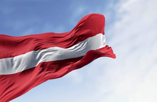 Republic of Latvia national flag waving in the wind on a clear day. Red field with a white horizontal line in the middle. 3d illustration render. Rippling fabric. Waving flag