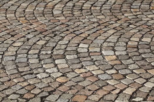 Gray cobblestone with curves, paving stones, Germany, Europe