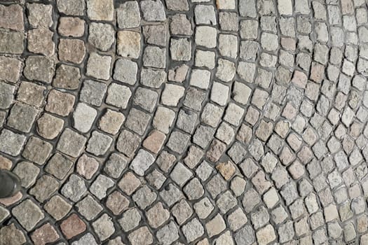 Gray cobblestone with curves, paving stones, Germany, Europe