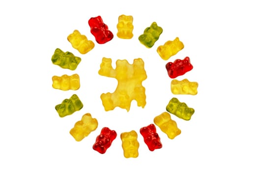 Gummy bears. Circle of fruity gummy bears with rainbow colors isolated on white. In the middle of the circle is a manufacturing error of gummy bears. Teddy bear circle.