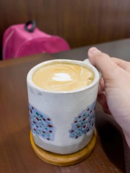 Hot coffee latte with mini heart art , stock photo