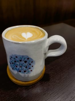 Hot coffee latte with mini heart art , stock photo