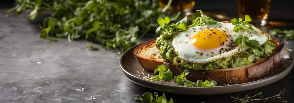 Avocado egg sandwich with whole grain bread on wooden background. Copy space Healthy lunch with fried eggs and Guacamole on toast. Diner or breakfast. Food concept close up