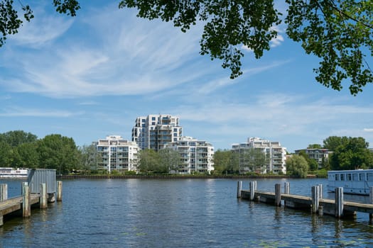 Urban development with expensive luxury real estate on the banks of the Spree in Berlin's Alt Stralau district
