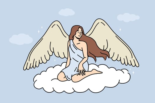 Woman angel with large wings sits on flying cloud in heaven, symbolizing innocence and purity or absence of harmful thoughts. Beautiful girl with angel wings and long hair smiles soaring in sky