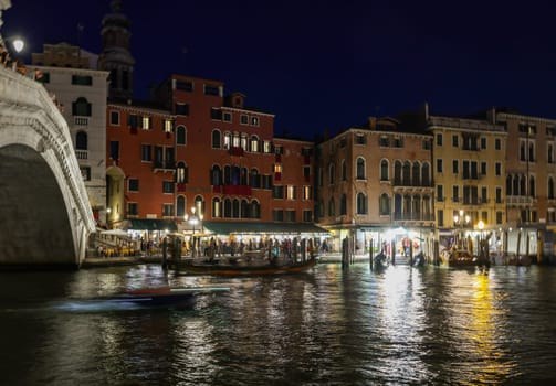 Venice, Italy - September 4, 2022: The Grand Canal near the Rialto Bridge at night