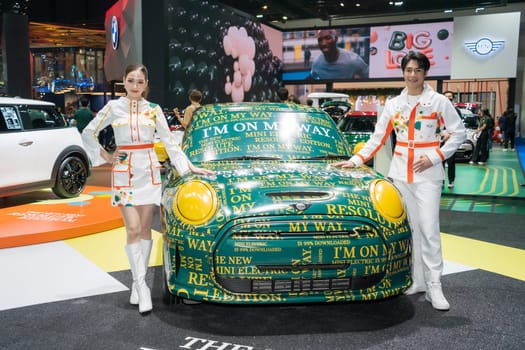 Nonthaburi, Thailand - APR 2, 2023 Unidentified model poses with a car at The 44th Bangkok international motor show 2023 at IMPACT Arena, Muang Thong Thani, Nonthaburi, Thailand.