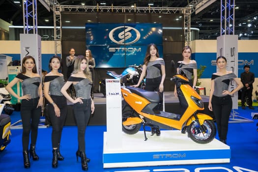 Nonthaburi, Thailand - APR 2, 2023 Unidentified model poses with a car at The 44th Bangkok international motor show 2023 at IMPACT Arena, Muang Thong Thani, Nonthaburi, Thailand.