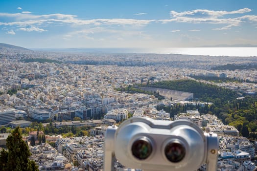 Athens, Greece, November 26th 2023: High angle view over Athens with Panathenaic Stadium in the distance