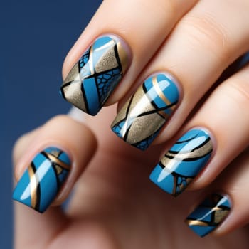 Bright manicure with a geometric pattern in blue and gold with black lines. nail design. content for beauty salons and bloggers on social networks.