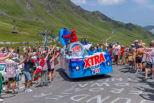 Col du Tourmalet, France - July 06 2023: Caravan car at the top of the Col du Tourmalet in Pyerenees mountains during the stage 6 of Le Tour de France 2023