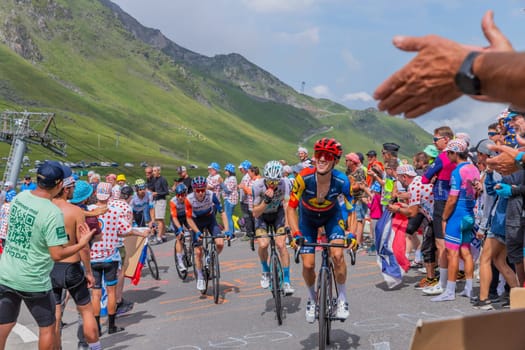 Col du Tourmalet, France - July 06 2023: Riders climbig the road to Col du Tourmalet in Pyerenees mountains during the stage 6 of Le Tour de France 2023.
