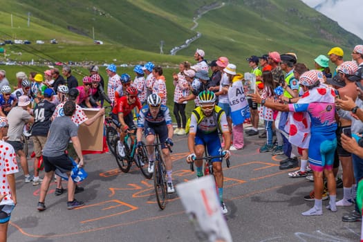 Col du Tourmalet, France - July 06 2023: Riders climbig the road to Col du Tourmalet in Pyerenees mountains during the stage 6 of Le Tour de France 2023.
