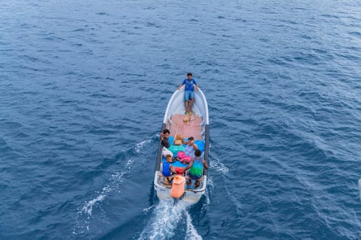 Viti Levu, Fiji: 29 May 2023: Group of tourists on a ship in the coast of Denarau port. Viti Levu. Fiji
