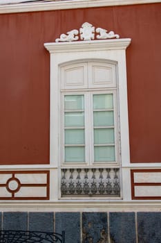 Old window on a house on the Canary Island of Gran Canaria in Spain