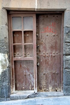 Old wooden door on a house on the Canary Island of Gran Canaria in Spain
