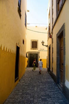 Narrow street with old houses in the historic old town of Las Palmas on the Canary Island of Gran Canaria, Spain, Europe