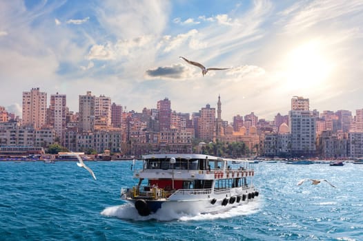 Cruise ship by the shore of the sea, area of he Abu al-Abbas al-Mursi Mosque in Alexandria, Egypt.