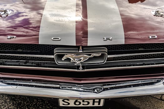 WETTENBERG, HESSE, GERMANY - 07 - 28 - 2023: Front of FORD Mustang with Horse Symbol at a Car show Golden Oldies in Krofdorf-Gleiberg, Hesse.