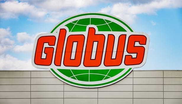 HUETTENBERG, HESSE - GERMANY 03_07_2023: GLOBUS Logo on a Facade. The Globus Group, led by Globus Holding GmbH & Co. KG, is a retail company based in St. Wendel.