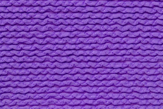 Pink fabric texture. Close-up of an elastic blue nylon fabric with seamless pattern for sports equipment, backpacks, bags or other garments. Macro.