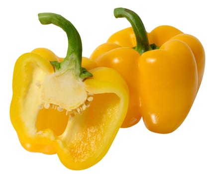 Half and whole yellow pepper on white isolated background