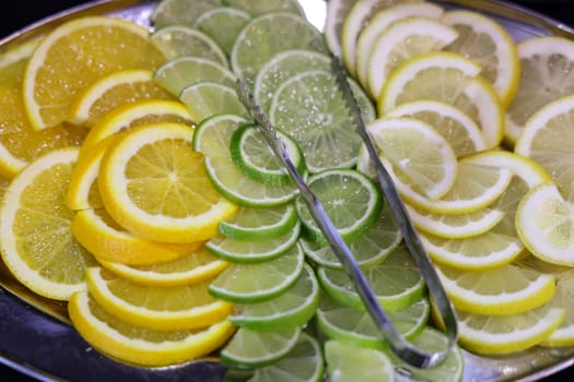 Mixed citrus fruit on plate