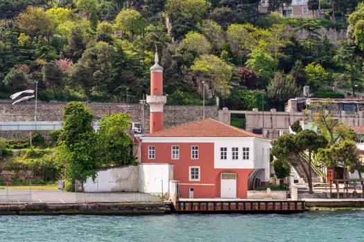 View from Europian side of Bosphorus Strait overlooking Old Ottoman Defterdar Ibrahim Pasa Mosque, suited in Ortakoy neighbourhood, at Besiktas district, Istanbul, Turkey
