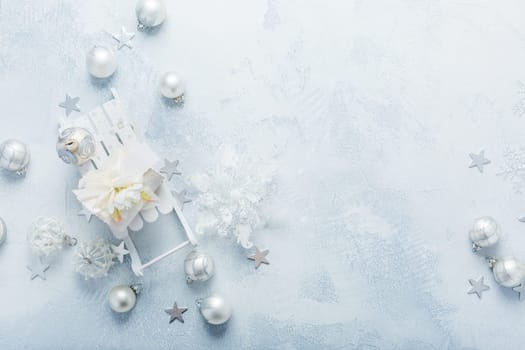 Christmas ornaments and ball in white and blue tone. Holiday Christmas background with copy space