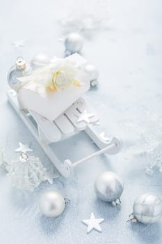 Christmas ornaments and ball in white and blue tone. Holiday Christmas background with copy space