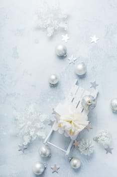 Christmas ornaments and ball in white and blue tone. Holiday Christmas background with copy space