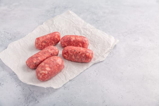 Raw Italian sausage, delicious small Salsiccia sausages with herbs