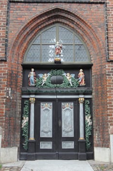 Intricately decorated entrance to the St. Nikolai Church in Stralsund