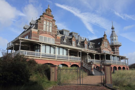 The Badpaviljoen is an iconic building on the dunes of the Dutch seaside resort Domburg. The building was registered as a national monument on 11 May 1983 in the monument register.