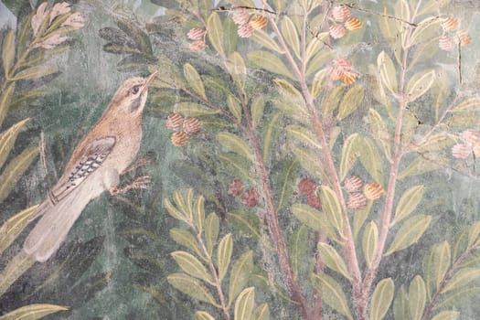 Italy, Pompeii - Luxury roman house interior, fresco detail with bird in a garden, 79 AD