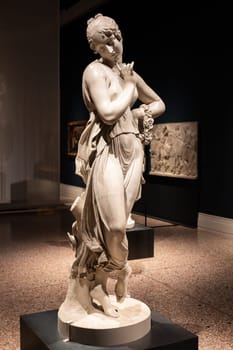 Bassano del Grappa, Italy - December 2022: Dancer with finger on her chin, by Antonio Canova, 1814. Classic statue, Roman beauty