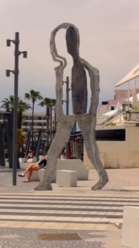 Cala Millor, Mallorca, Spain, May 24, 2023. A metallic sculpture in the main shopping area in the popular vacation and seaside resort of Cala Millor. Mediterranean Sea. Balearic Islands.