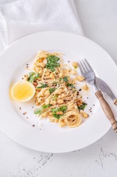 Lemon pasta with almonds, arugula and brown butter