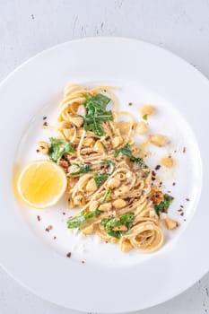 Lemon pasta with almonds, arugula and brown butter