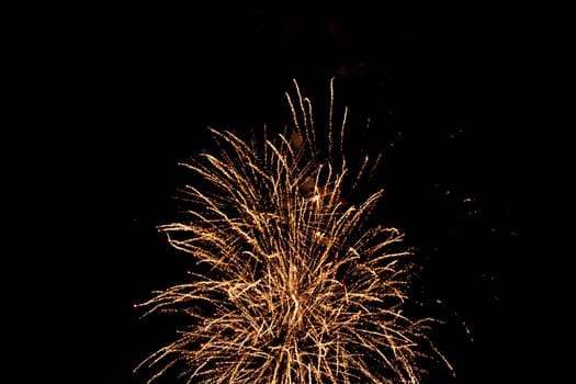 Big colorful fireworks in the black night sky