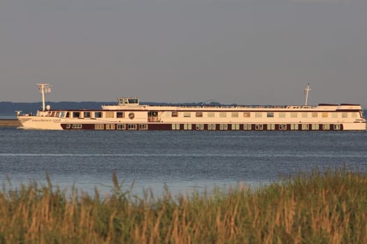 Bock, Germany August 5, 2017: An excursion boat passes through the Baltic Sea off the island of Bock