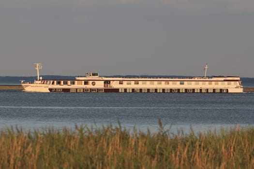 Bock, Germany August 5, 2017: An excursion boat passes through the Baltic Sea off the island of Bock