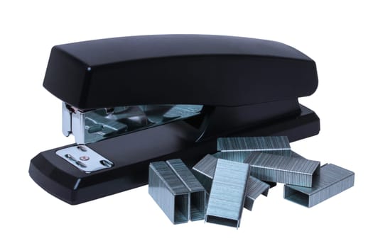 Black professional stapler with a stack of metal staples isolated on a white. Clipping path. Office supplies, stationery, sharpener and others. Office equipment. Macro.