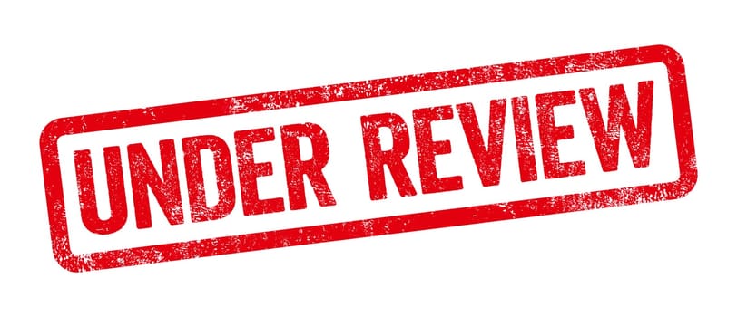 Red stamp on a white background - Under review