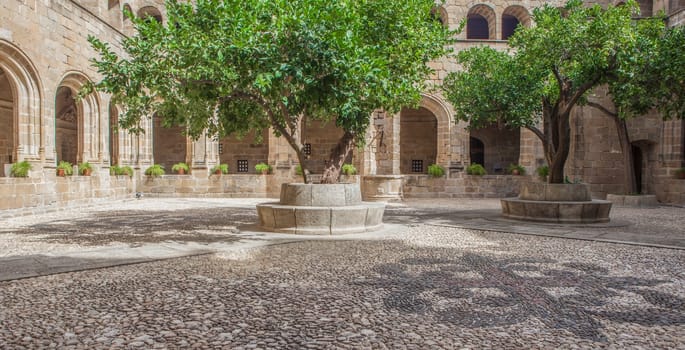 Alcantara, Spain - Oct 6th, 2022: Gothic Cloister of Convent of San Benito de Alcantara, Caceres, Spain. Former refectory