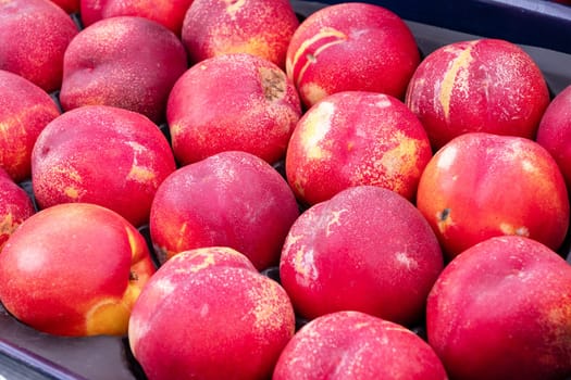 a close up of organic peaches