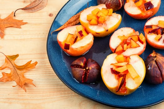 Caramelized baked autumn apples and figs. Homemade vegan dessert